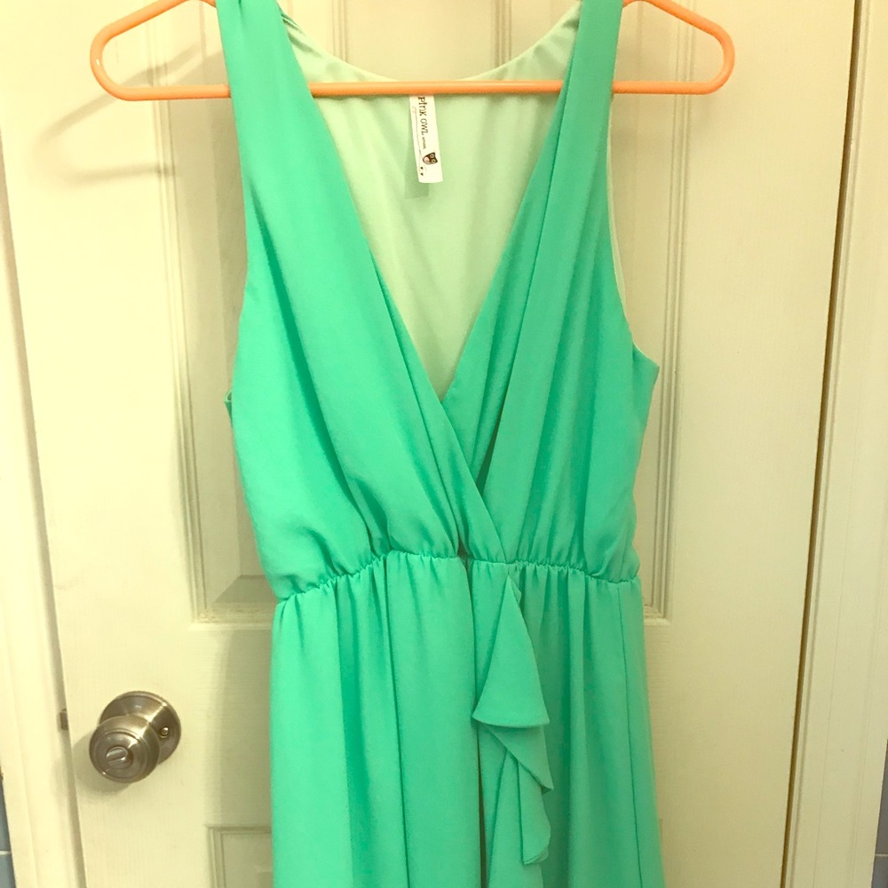 Mint green sleeveless dress.